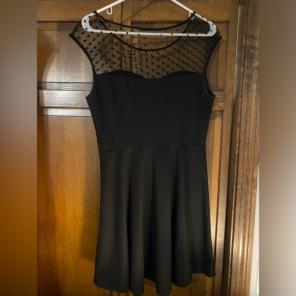 Black dress with sheer top, heart chest line